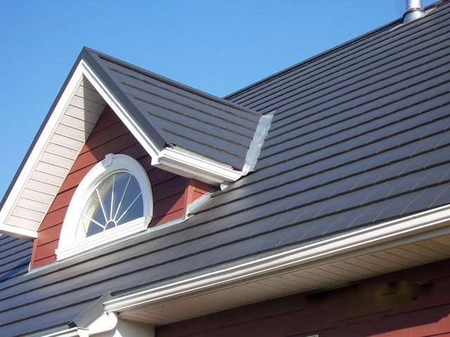 Pose de Gouttières Blanches en Aluminium sur Toiture Rénovée à Carvin